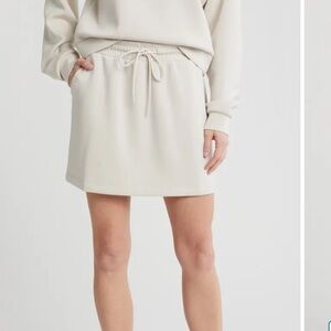 Zella Women's Off-White Mini Skirt with ruched top -set